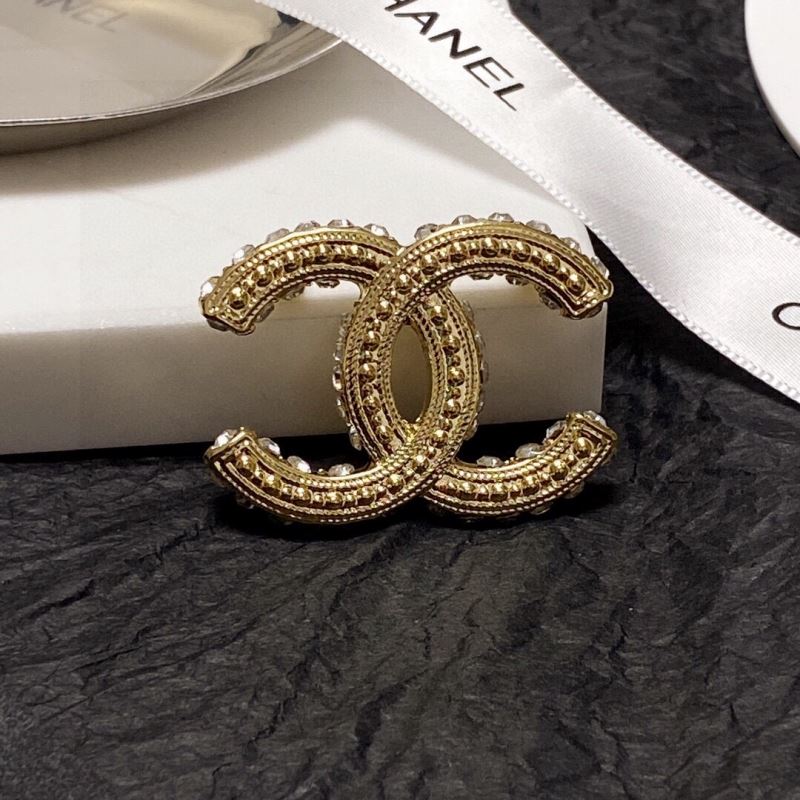 Ch**el brooches